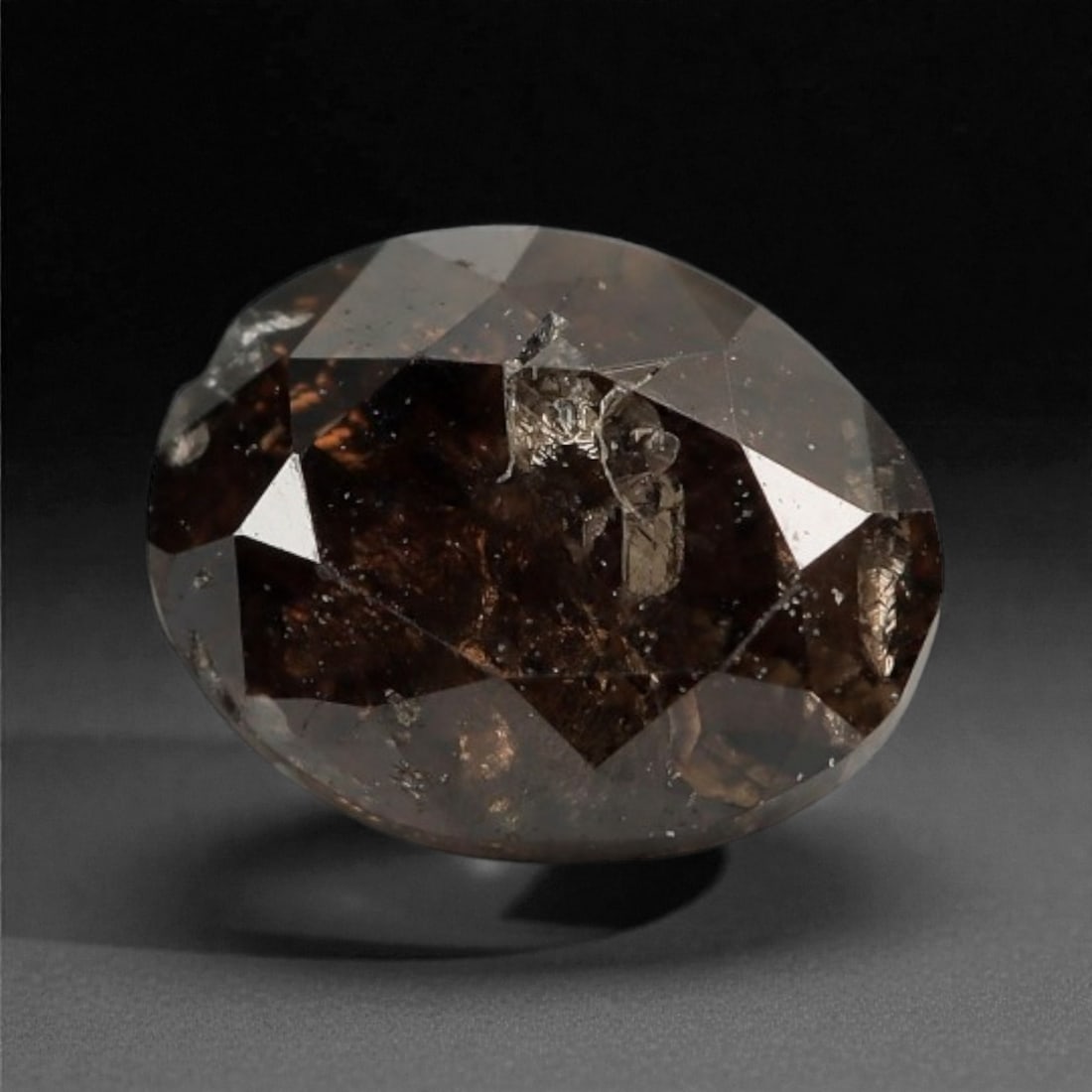 0.29 Carats Cognac Fancy Diamond - Natural African Stone, 4.5x3.5mm, 37A: This singular cognac fancy diamond radiates with a warm, ambered glow, evoking the rich tones of aged brandy and sunlit honey. Precision-cut in a classic brilliant shape, its facets catch light to rev