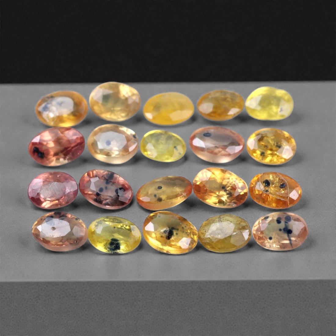 5.62 Carats Multicolor Parti Sapphire Parcel - Natural Madagascar Stones, 4.6x3.1mm, 90XH: This lively parcel of multicolor sapphires showcases a kaleidoscope of warm hues-ranging from golden yellow and honey orange to peach, blush pink, and salmon red. Many stones feature distinctive inky