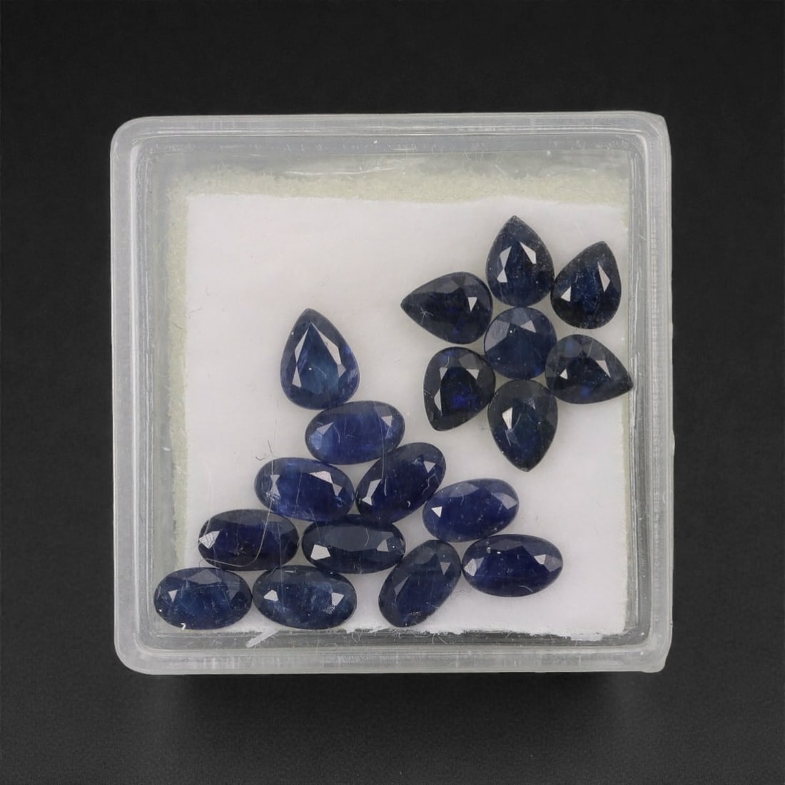 5.36 Carats Deep Royal Blue Sapphire Parcel - Natural Australian Stones, 5XL: This curated parcel of 5.36 carats of loose sapphires captivates with a spectrum of deep royal blue hues, ranging from velvety midnight tones to vivid, saturated shades that catch the light with every