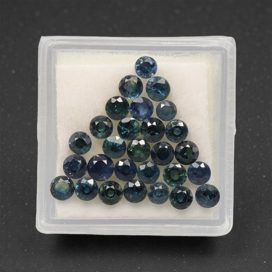 6.46 Carats Multitone Parti Sapphire Parcel - Natural Australian Stones, 85XK: This substantial parcel of parti sapphires dazzles with a rich spectrum of deep teal, forest green, and moody blue tones, each round, faceted stone showcasing dynamic color zoning that shifts and glow