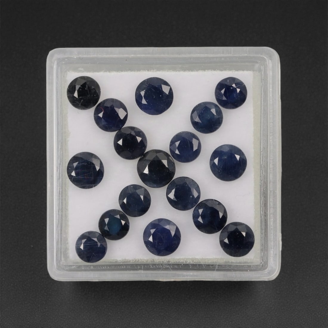 6.18 Carats Deep Blue Australian Sapphire Parcel - Natural Australian Stones, 96XK: This substantial parcel of Australian sapphires features a rich palette of deep, velvety blue tones, with each round, faceted stone exhibiting a classic, saturated hue. The generous carat weight and u