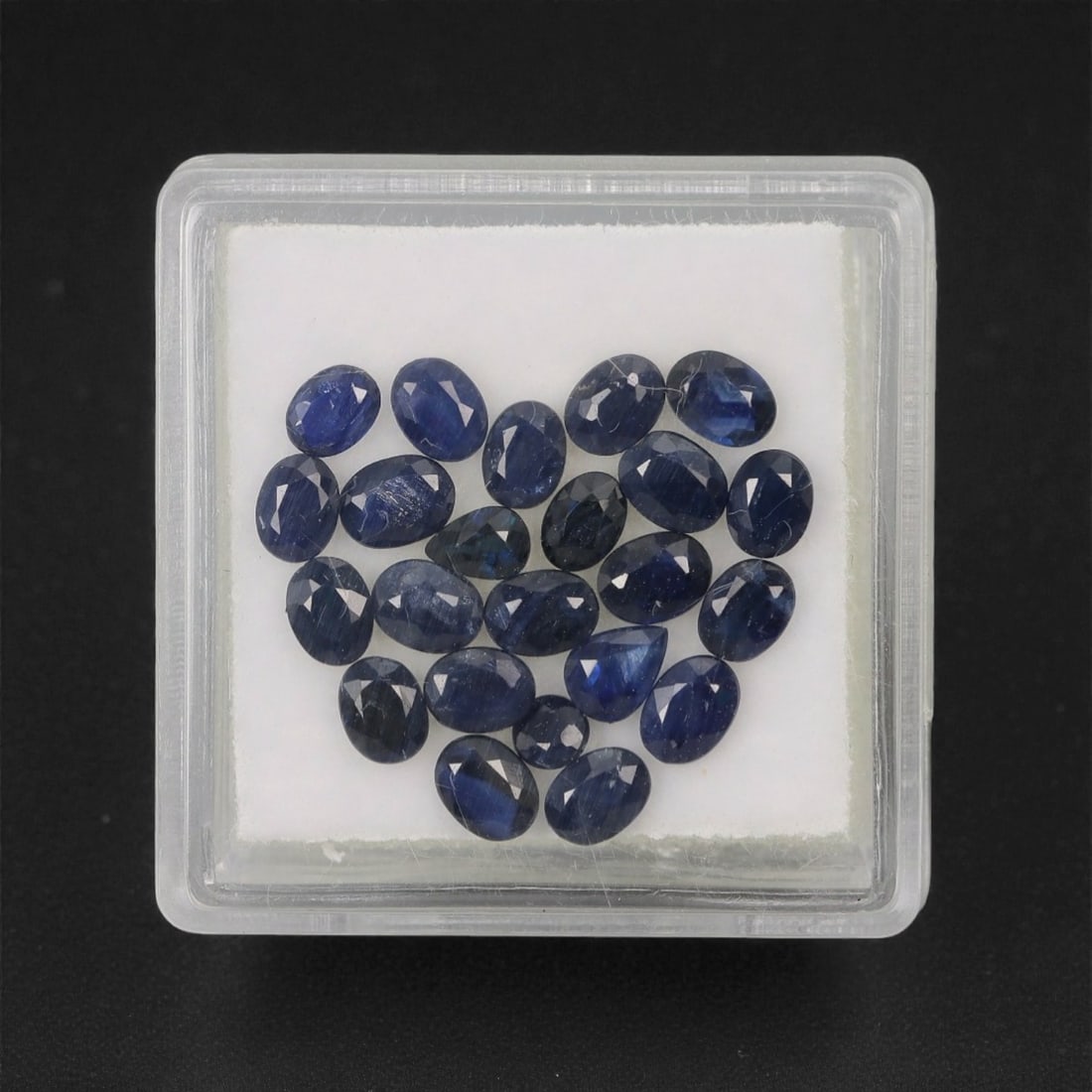 4.58 Carats Deep Royal Blue Sapphire Parcel - Natural Australian Stones, 55XL: This curated parcel of 4.58 carats of loose sapphires captivates with a spectrum of deep royal blue hues, ranging from velvety midnight tones to vivid, saturated shades that catch the light with every