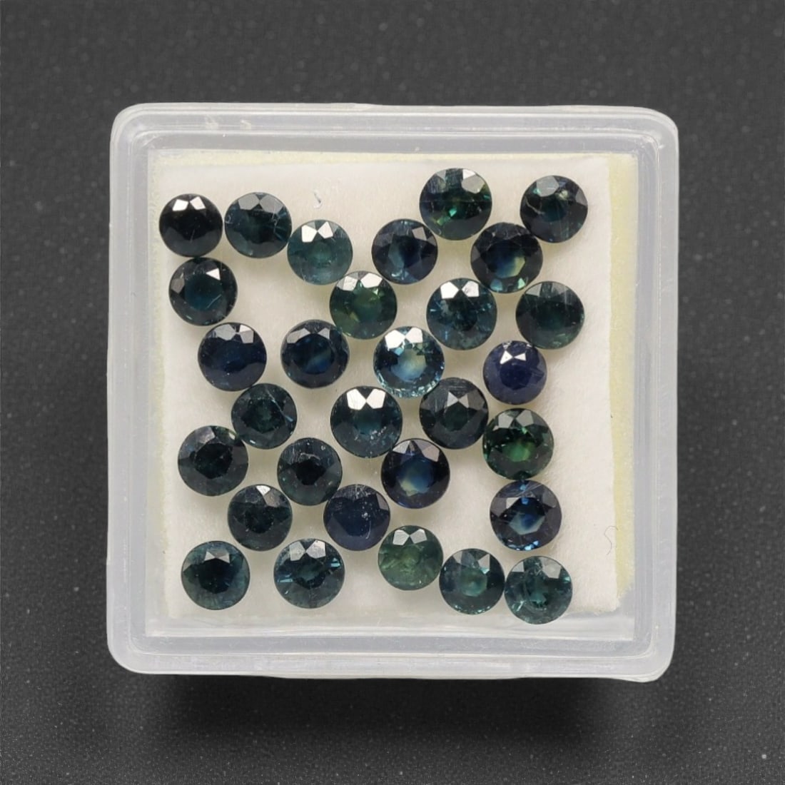 6.72 Carats Teal-Blue Parti Sapphire Parcel - Natural Australian Stones, 88XK: This substantial parcel of parti sapphires dazzles with a rich spectrum of deep teal, forest green, and moody blue tones, each round, faceted stone showcasing dynamic color zoning that shifts and glow
