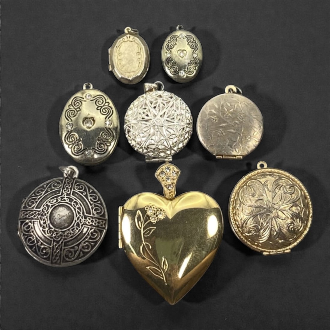 An Estate Lot of Eight Lockets, Late 20th Century, 90FK (1 of 1)