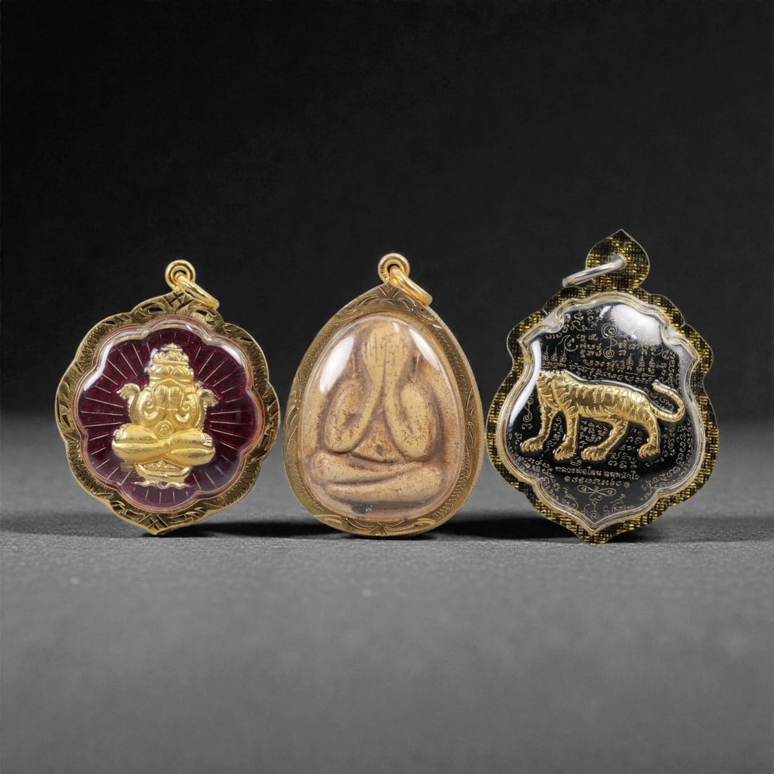 A Group of Three Thai Amulets, 20th Century, 48FL (1 of 1)