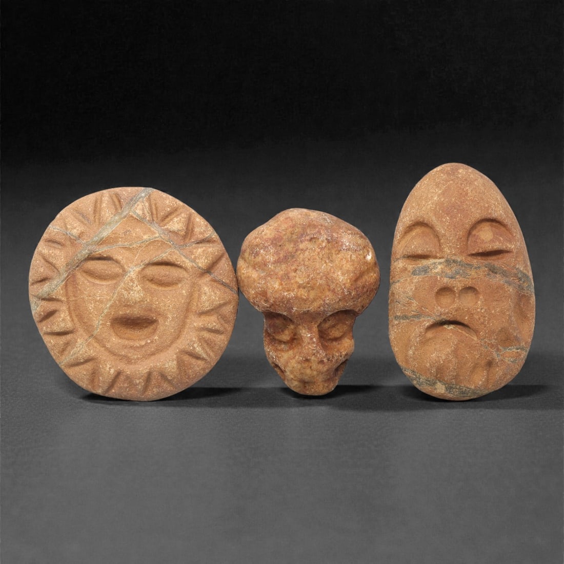 A Group of Three Medieval Stone Maskette Amulets, 10th-14th Century CE, 6ZH (1 of 1)
