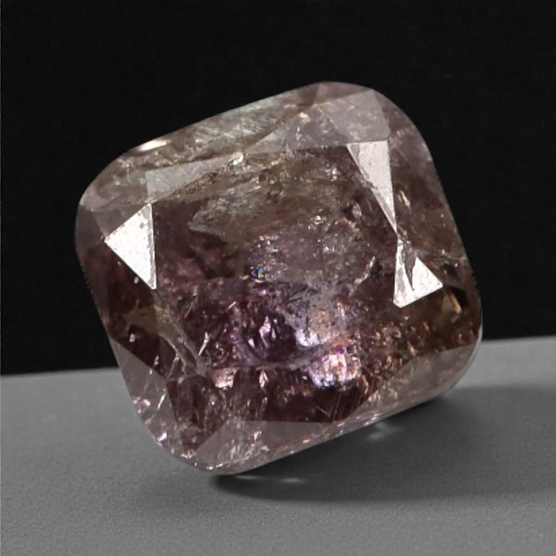 0.19 Carats Purplish Pink Diamond - Natural Argyle Mine, Australia, 99A: This singular purplish pink diamond from the Argyle mine is a rare and captivating gem, showcasing the distinctive, velvety hue that has made Australian pink diamonds among the most coveted in the wor