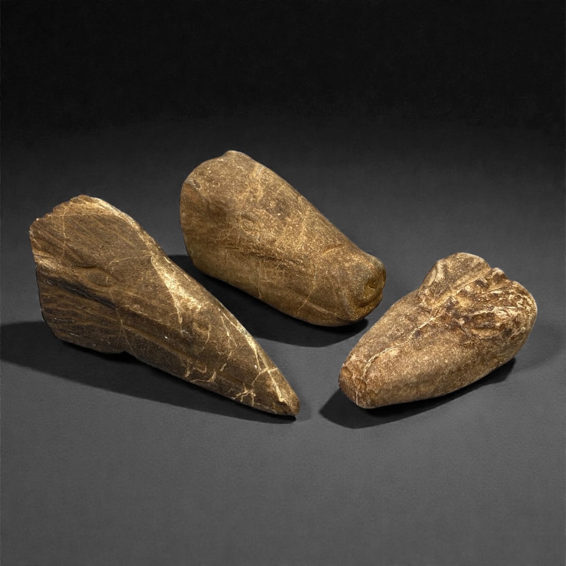 A Group of Three Ancient Near Eastern Zoomorphic Stone Heads, 2nd-1st Millennium BCE, 59FL (1 of 1)