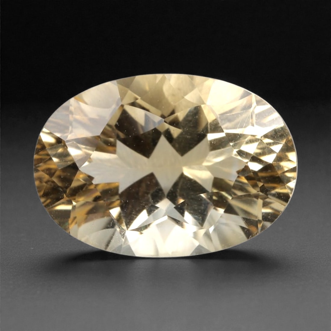 4.83 Carats Golden Yellow Citrine - Natural Brazilian Stone, 381A: This exceptional oval-cut citrine gemstone captivates with a rich, honeyed golden-yellow hue, reminiscent of sunlit amber and liquid gold. The precision faceting maximizes light dispersion, creating a