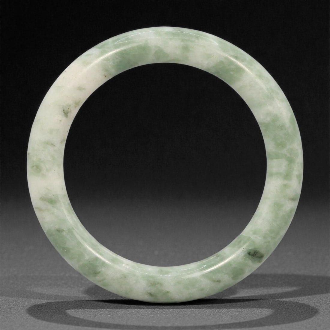 A Chinese Jadeite Jade Bangle Bracelet, 20th Century, 22YC (1 of 2)