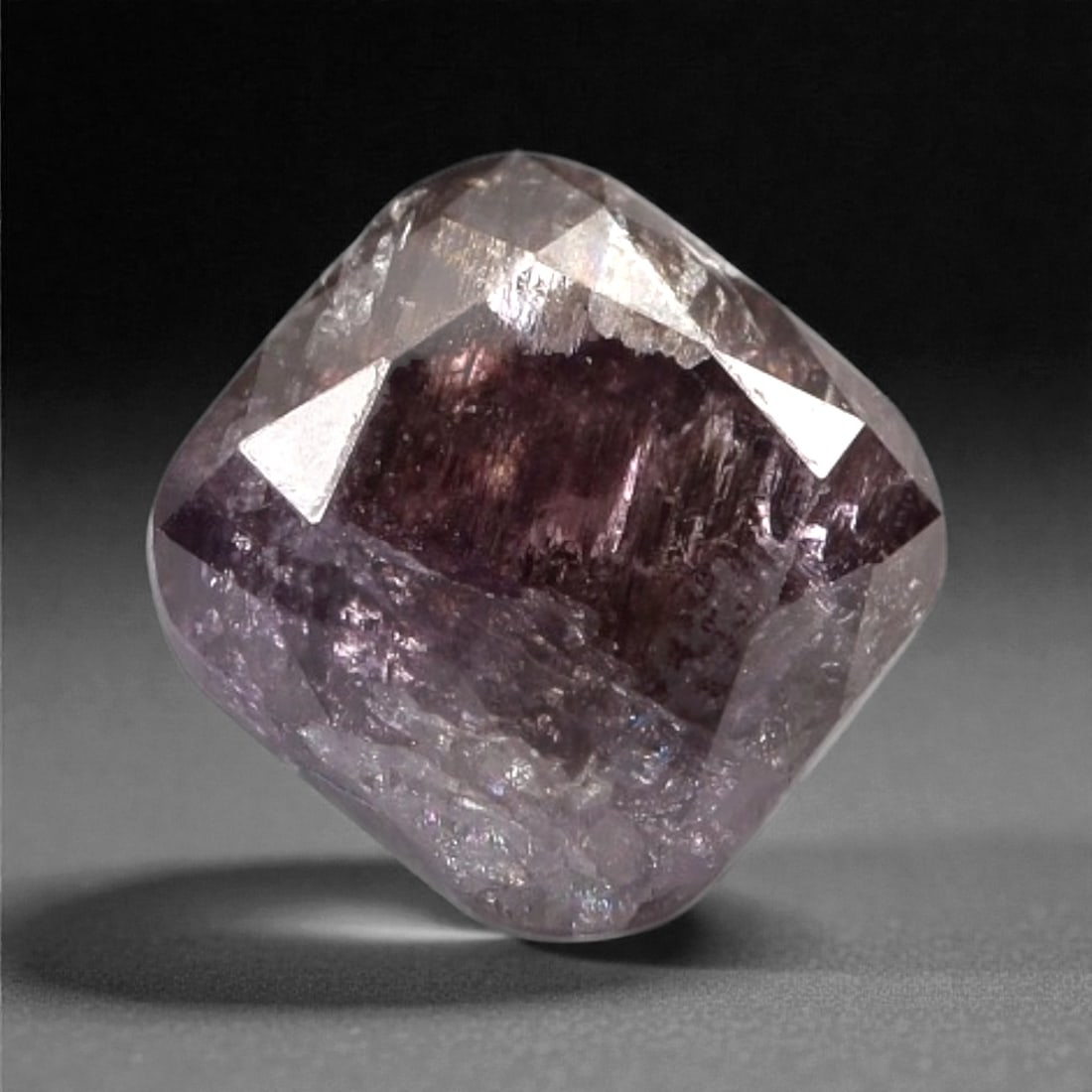 0.31 Carats Purplish Pink Diamond - Natural Argyle Mine, Australia, 85A: This singular purplish pink diamond from the Argyle mine is a rare and captivating gem, showcasing the distinctive, velvety hue that has made Australian pink diamonds among the most coveted in the wor