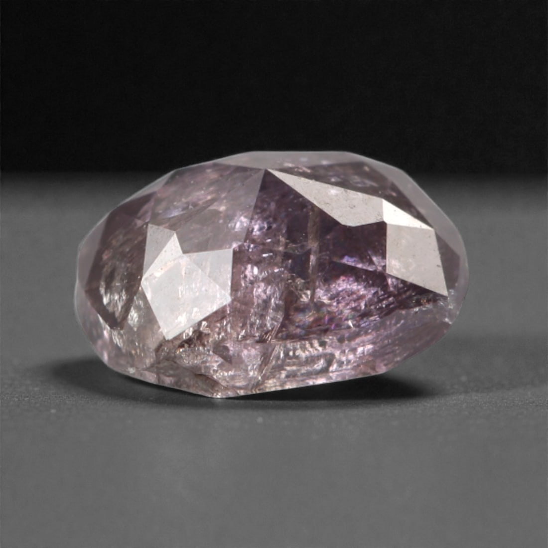 0.39 Carats Purplish Pink Diamond - Natural Argyle Mine, Australia, 106A: This singular purplish pink diamond from the Argyle mine is a rare and captivating gem, showcasing the distinctive, velvety hue that has made Australian pink diamonds among the most coveted in the wor