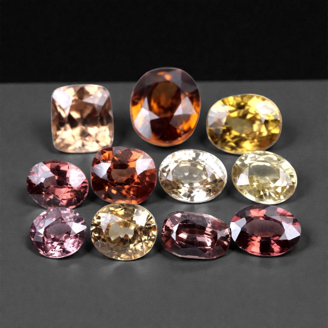 20.34 Carats Multicolor Zircon Selection - Natural Cambodian Stones, 5-8mm, 65XH: This radiant parcel of natural zircon offers a rich spectrum of earth-toned brilliance, including golden yellow, champagne, cinnamon orange, blush pink, and deep wine hues. Each gem is precision-facet