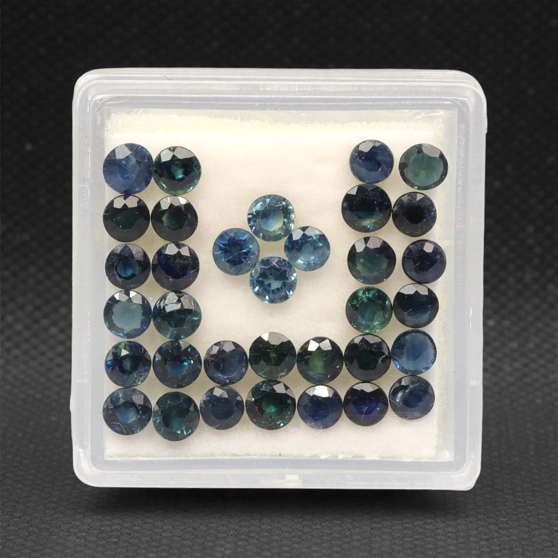 5.50 Carats Parti-Colored Australian Sapphire Parcel - Natural Loose Gemstones, 46DB: This curated parcel of Australian parti sapphires dazzles with a dynamic interplay of deep blue, teal, and rich green hues, each stone exhibiting the distinctive color zoning that makes Australian sap