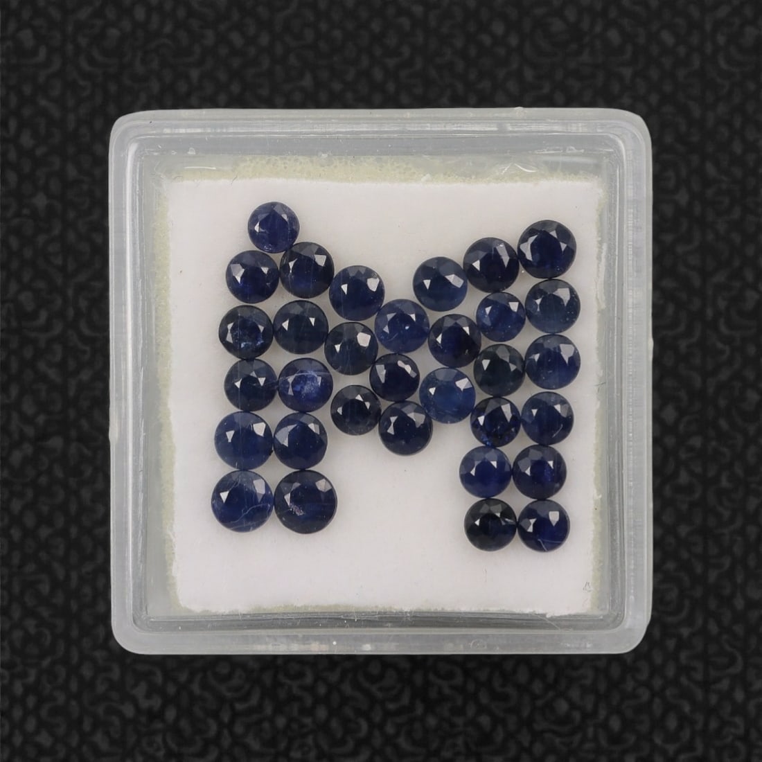 3.98 Carats Deep Blue Australian Sapphire Parcel - Natural Australian Stones, 93XK: This curated parcel of Australian sapphires showcases a rich spectrum of deep, velvety blue tones, with each round, faceted stone exhibiting a classic, saturated hue. The varied yet cohesive palette o