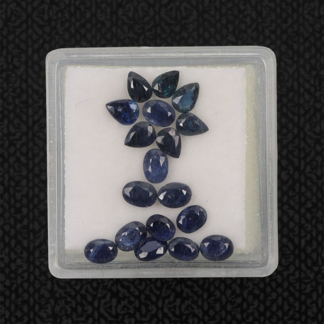 4.06 Carats Deep Royal Blue Sapphire Parcel - Natural Australian Stones, 43XL: This curated parcel of 4.06 carats of loose sapphires captivates with a spectrum of deep royal blue hues, ranging from velvety midnight tones to vivid, saturated shades that catch the light with every