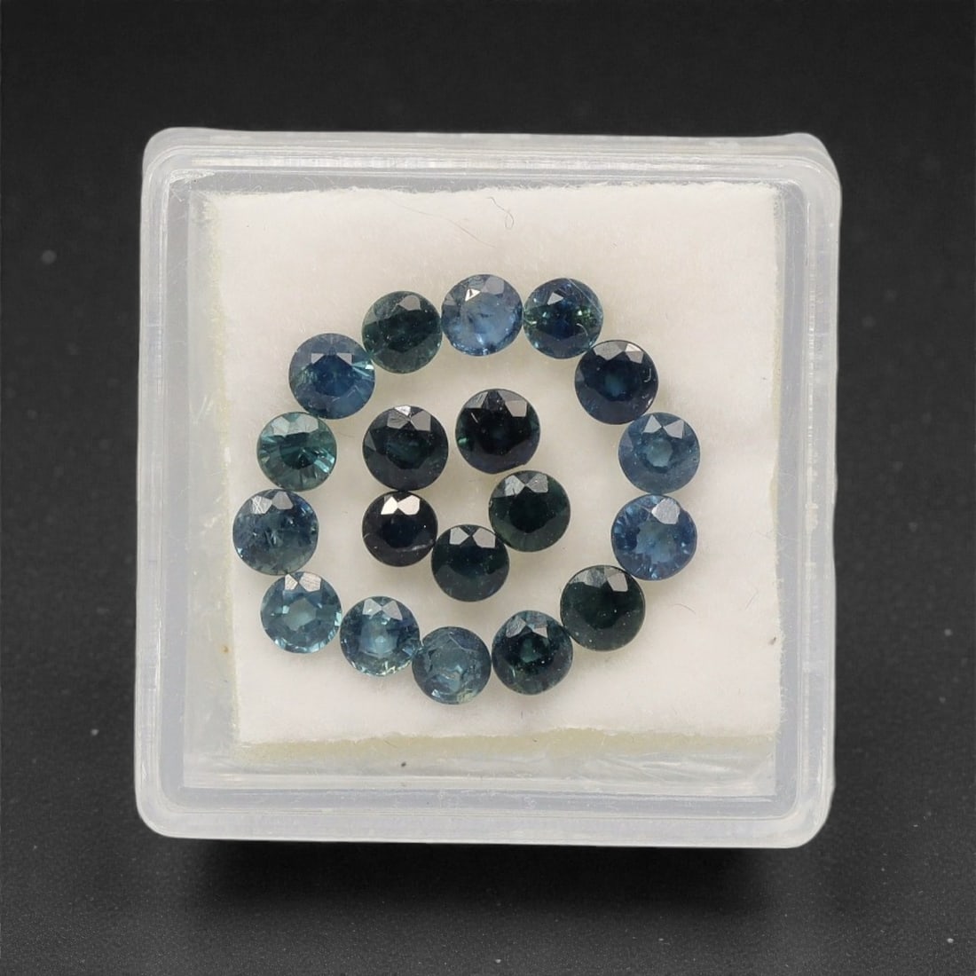 4.34 Carats Teal-Blue Parti Sapphire Parcel - Natural Australian Stones, 75XK: This luminous parcel of parti sapphires glows with a harmonious blend of cool teal, soft blue-green, and subtle sky-blue tones, each round, faceted stone exhibiting delicate color zoning that shifts g