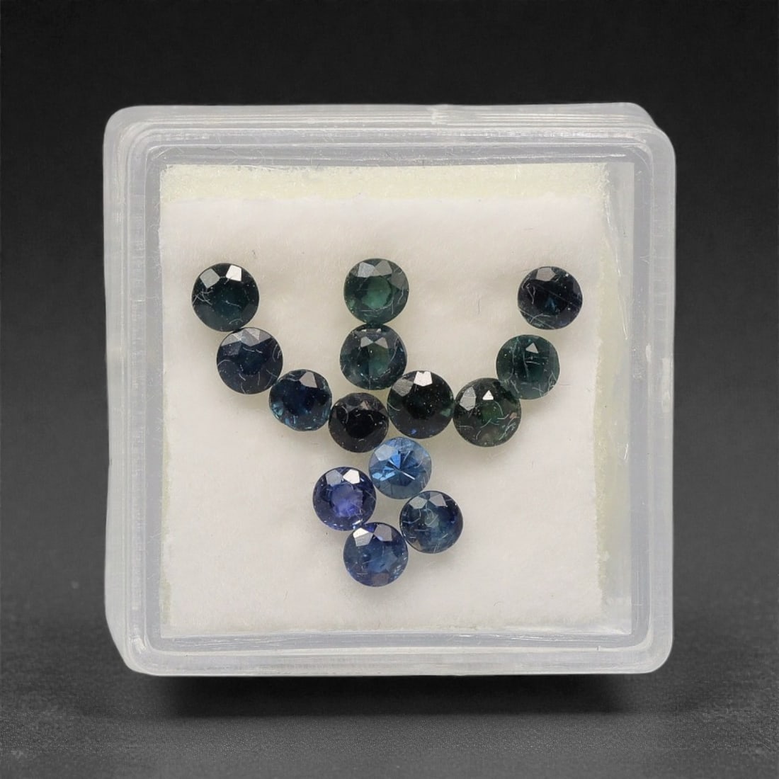 3.22 Carats Teal-Blue Parti Sapphire Parcel - Natural Australian Stones, 78XK: This curated parcel of parti sapphires presents a striking blend of deep teal, forest green, and vivid blue tones, with subtle color zoning that shifts dynamically across each round, faceted stone. Li