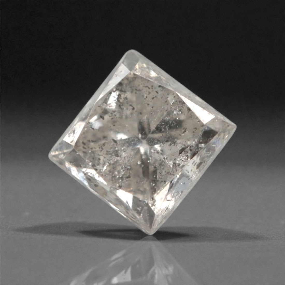 0.29 Carats Salt and Pepper Diamond - Natural South African Origin, 31DA: This 0.29 carat salt and pepper diamond features a transparent crystal matrix densely populated with fine black and white inclusions, creating a distinctive, textured appearance reminiscent of fine gr