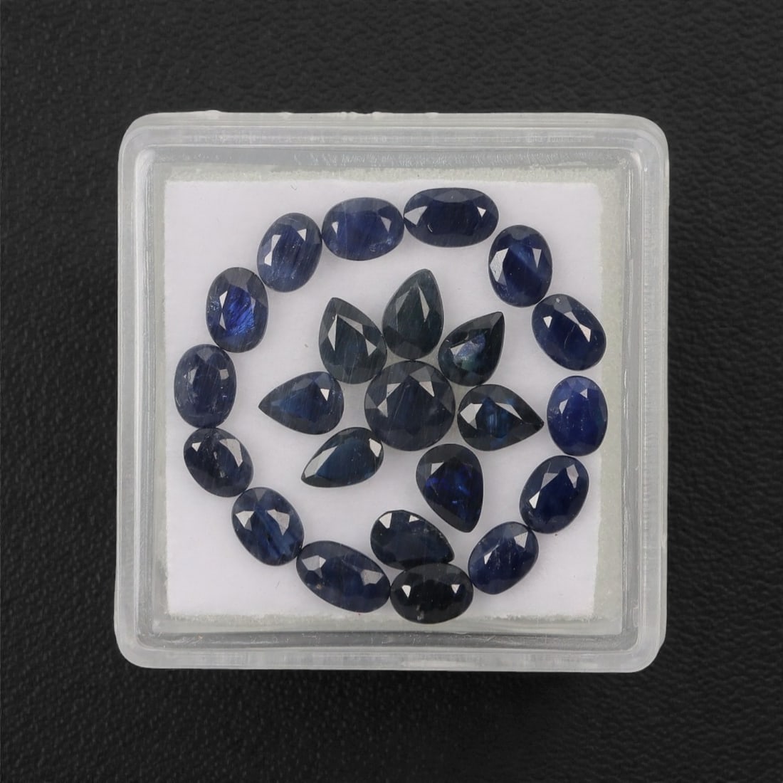 6.08 Carats Deep Royal Blue Sapphire Parcel - Natural Australian Stones, 61XL: This curated parcel of 6.08 carats of loose sapphires captivates with a spectrum of deep royal blue hues, ranging from velvety midnight tones to vivid, saturated shades that catch the light with every