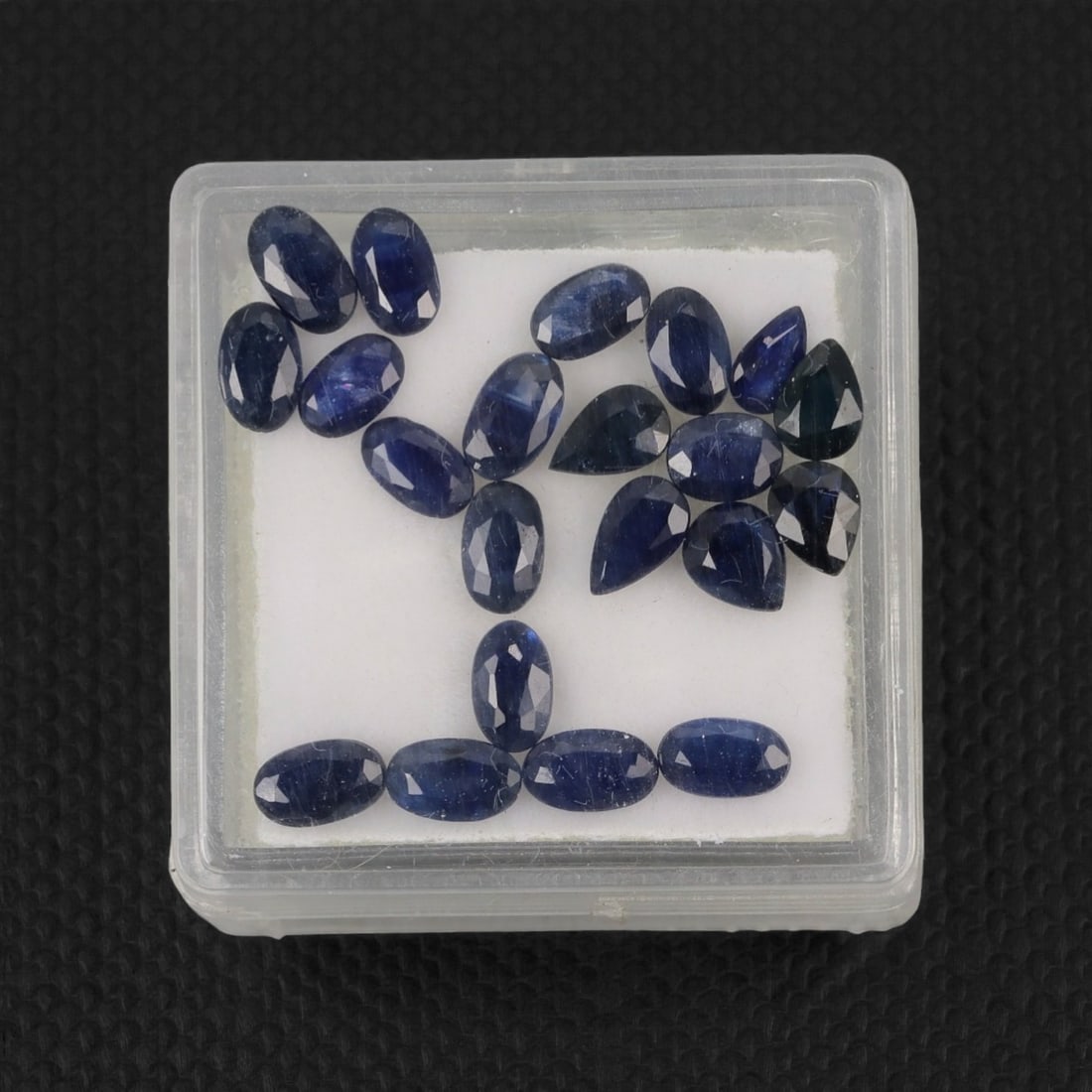 6.05 Carats Deep Royal Blue Sapphire Parcel - Natural Australian Stones, 11XL: This curated parcel of 6.05 carats of loose sapphires captivates with a spectrum of deep royal blue hues, ranging from velvety midnight tones to vivid, saturated shades that catch the light with every