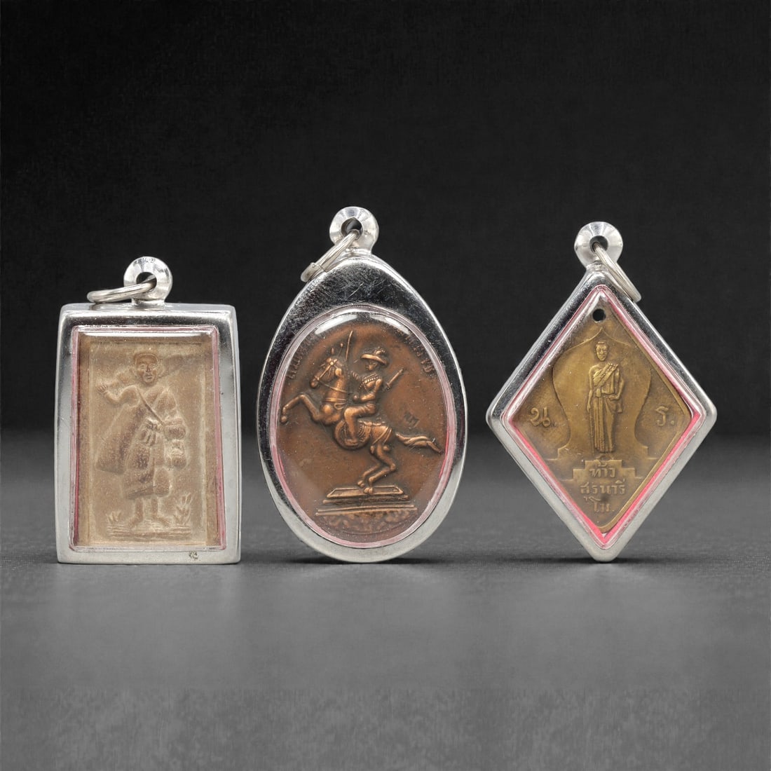 A Group of Three Thai Metal and Terracotta Amulets, 20th Century, 92XJ (1 of 1)
