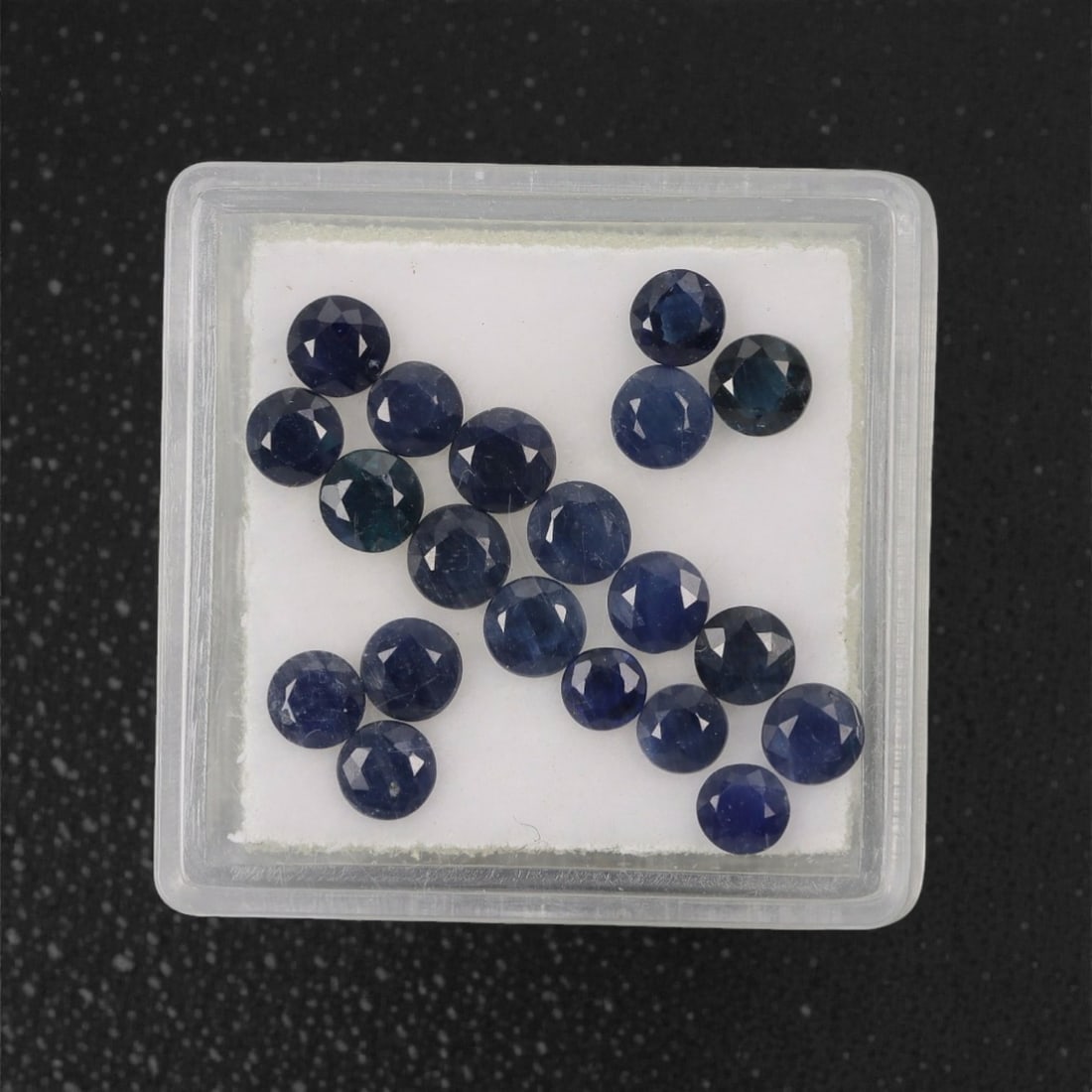 4.89 Carats Deep Royal Blue Sapphire Parcel - Natural Australian Stones, 65XL: This refined parcel of 4.89 carats of loose sapphires captivates with a spectrum of deep royal blue hues, ranging from velvety midnight tones to vivid, saturated shades that catch the light with every