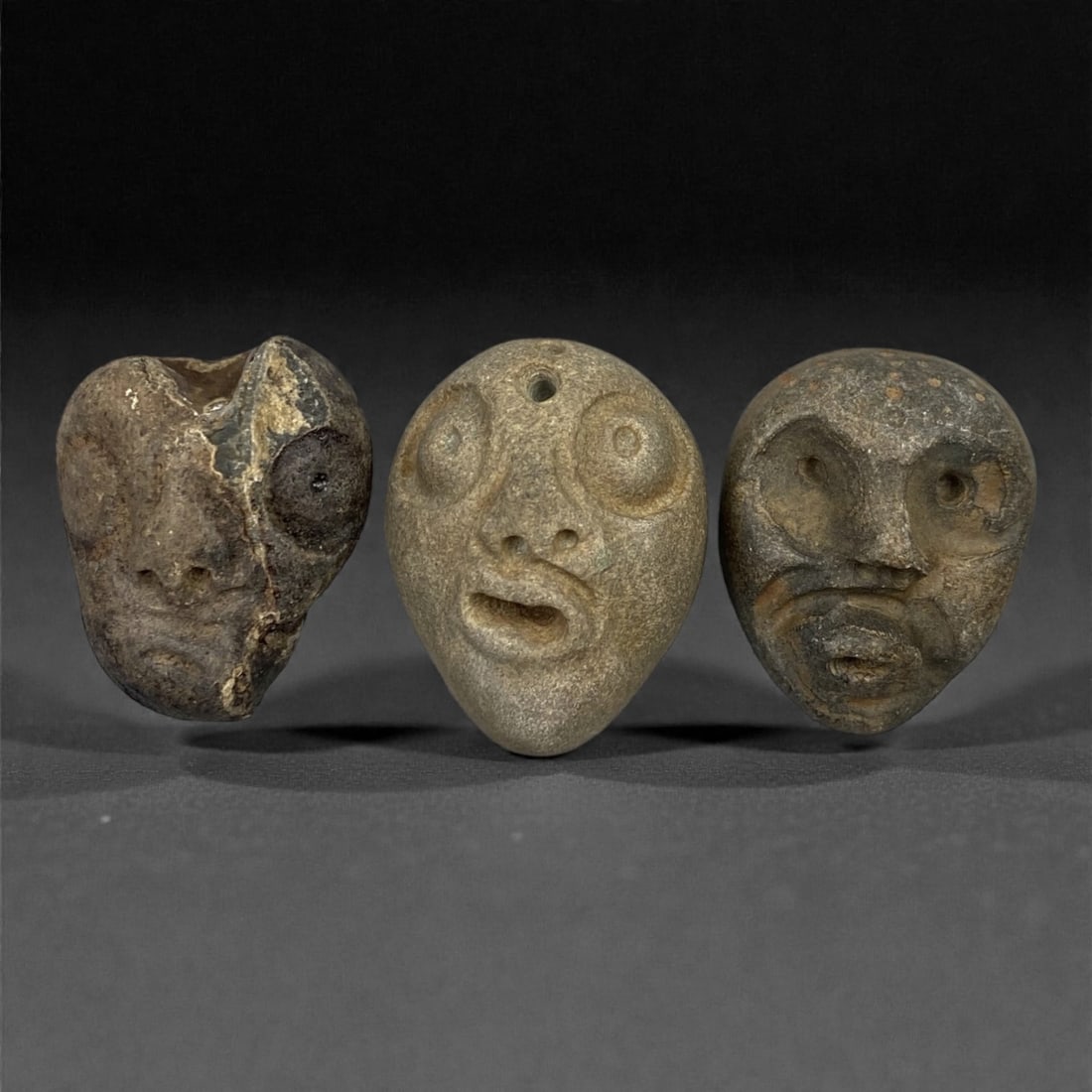 A Group of Three Medieval Stone Maskette Amulets, 10th-14th Century, 7FM (1 of 1)