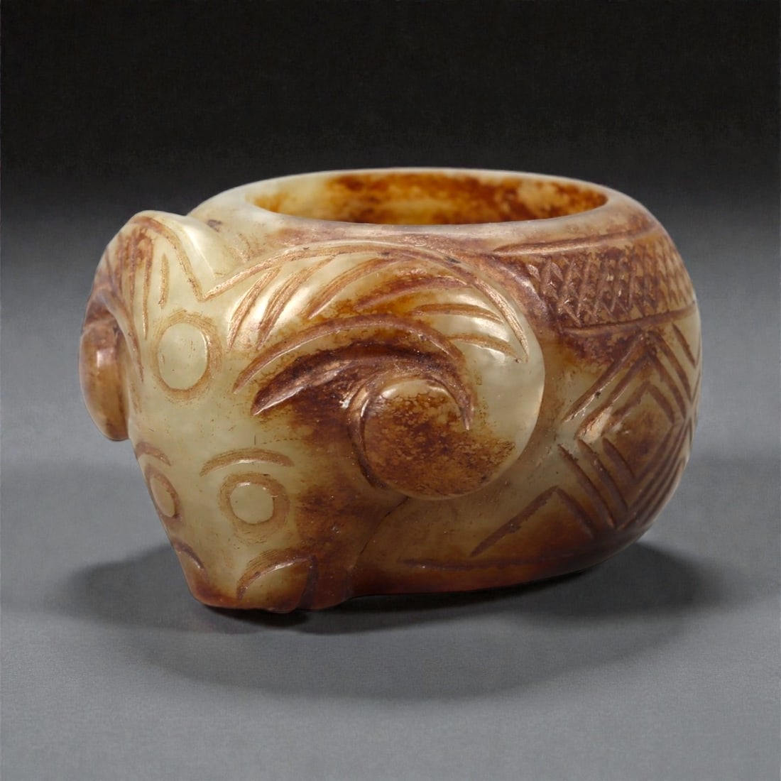 A Chinese Nephrite Jade Ram-Head Ring, 20th Century, 14FA (1 of 3)