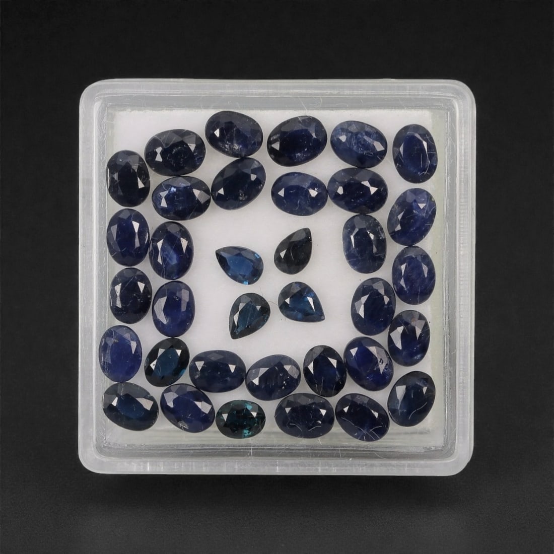 7.49 Carats Deep Royal Blue Sapphire Parcel - Natural Australian Stones, 53XL: This curated parcel of 7.49 carats of loose sapphires captivates with a spectrum of deep royal blue hues, ranging from velvety midnight tones to vivid, saturated shades that catch the light with every