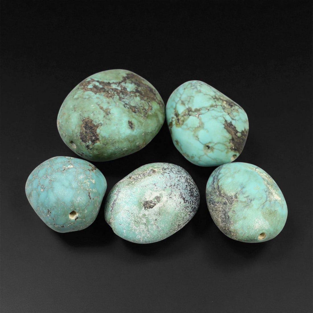 Vintage Tibetan Turquoise Bead Set, c. 20th Century 1.7 - 2.5cm, 54XD: This set of vintage Tibetan turquoise beads embodies the deep cultural significance long associated with turquoise across Himalayan regions. Valued for its protective qualities and symbolic link to sk