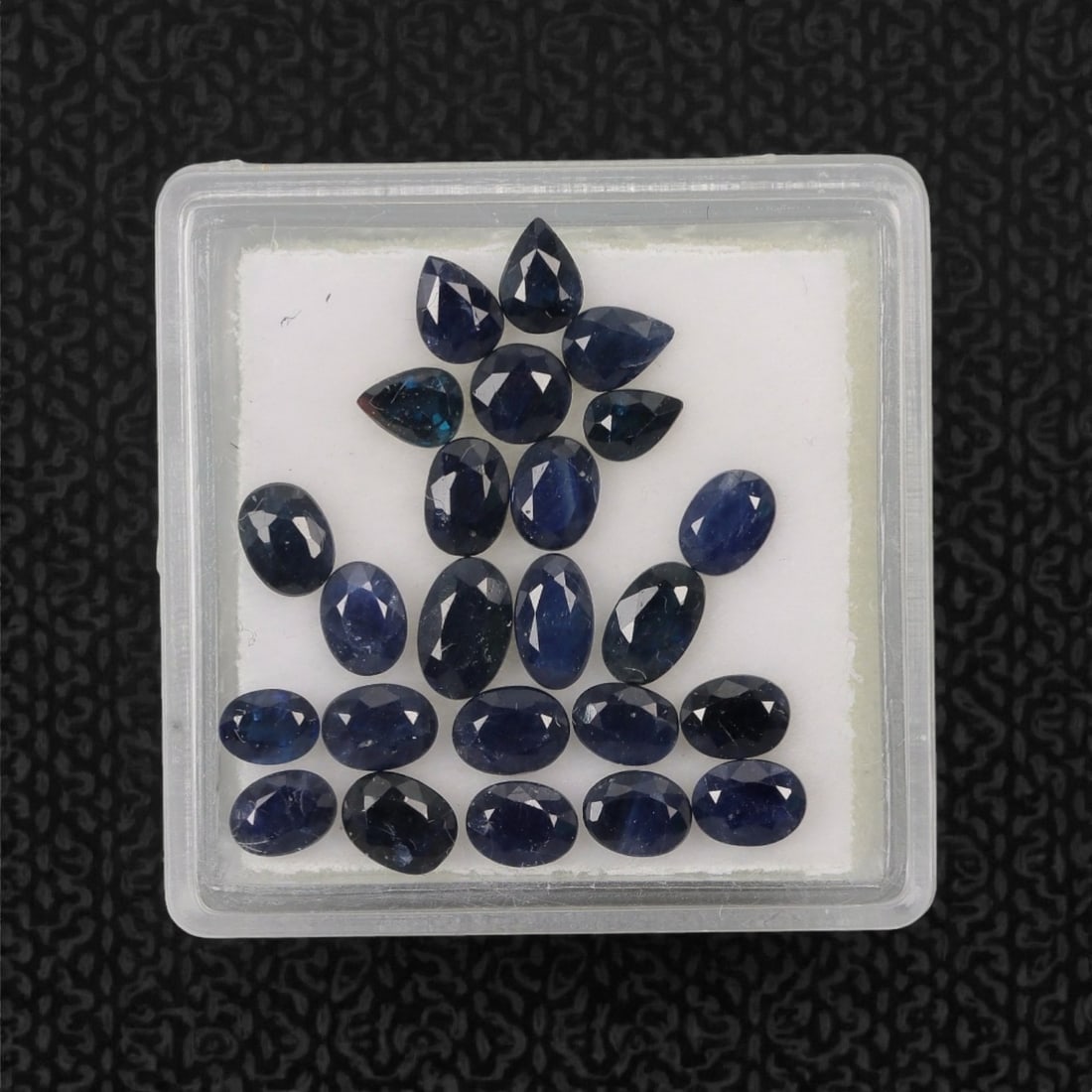 5.46 Carats Deep Royal Blue Sapphire Parcel - Natural Australian Stones, 56XL: This curated parcel of 5.46 carats of loose sapphires captivates with a spectrum of deep royal blue hues, ranging from velvety midnight tones to vivid, saturated shades that catch the light with every