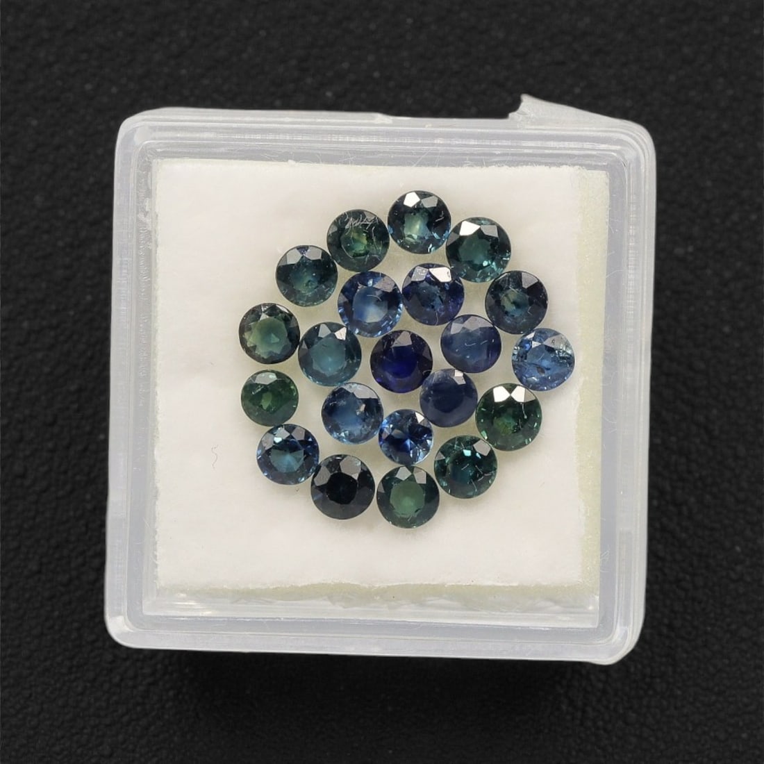 3.84 Carats Teal-Blue Parti Sapphire Parcel - Natural Australian Stones, 90XK: This luminous parcel of parti sapphires glows with a harmonious blend of cool teal, soft blue-green, and subtle sky-blue tones, each round, faceted stone exhibiting delicate color zoning that shifts g