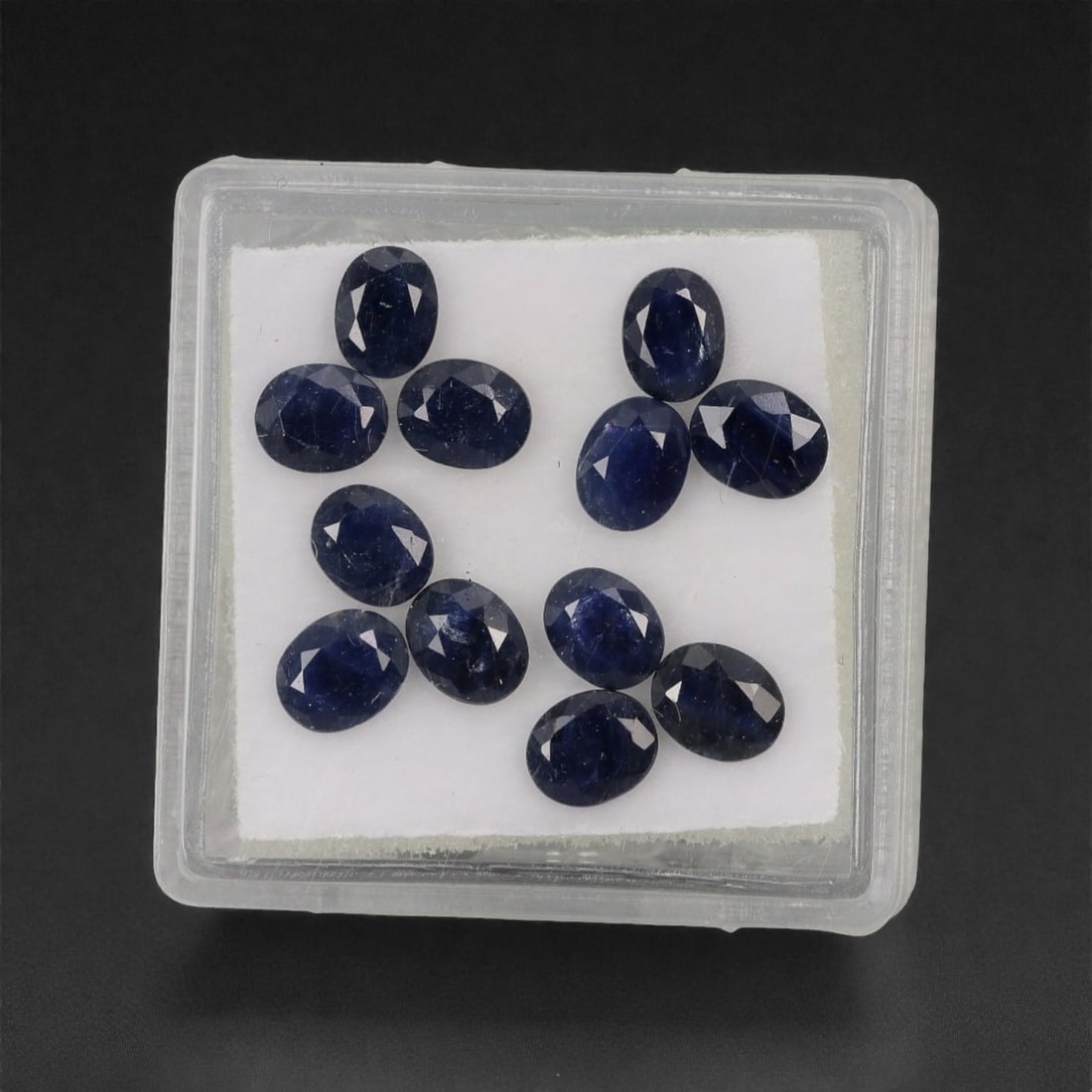 4.80 Carats Deep Royal Blue Sapphire Parcel - Natural Australian Stones, 32XL: This refined parcel of 4.80 carats of loose sapphires captivates with a spectrum of deep royal blue hues, ranging from velvety midnight tones to vivid, saturated shades that catch the light with every