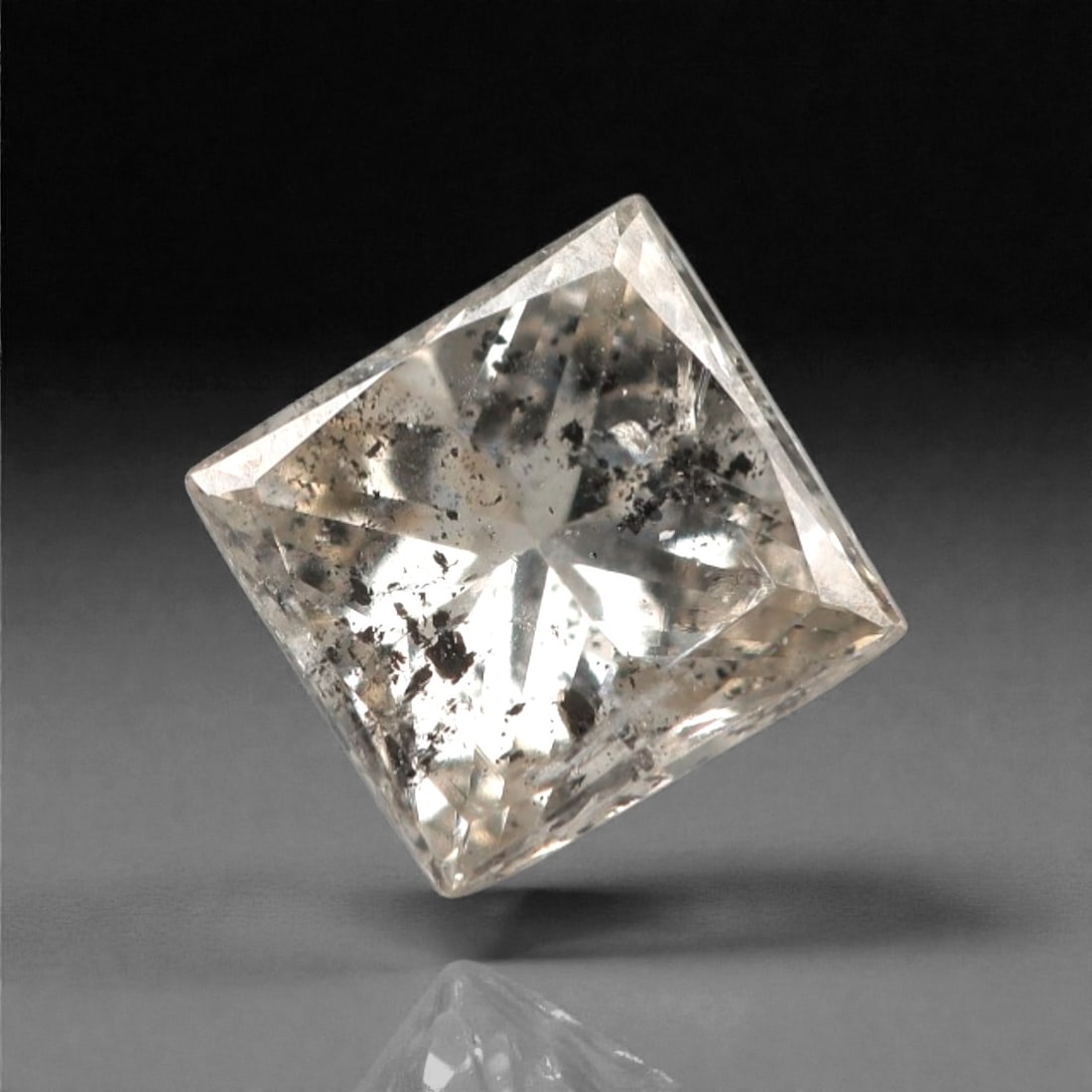 0.26 Carats Salt and Pepper Diamond - Natural South African Origin, 26DA: This 0.26 carat salt and pepper diamond features a transparent crystal matrix densely populated with fine black and white inclusions, creating a distinctive, textured appearance reminiscent of fine gr