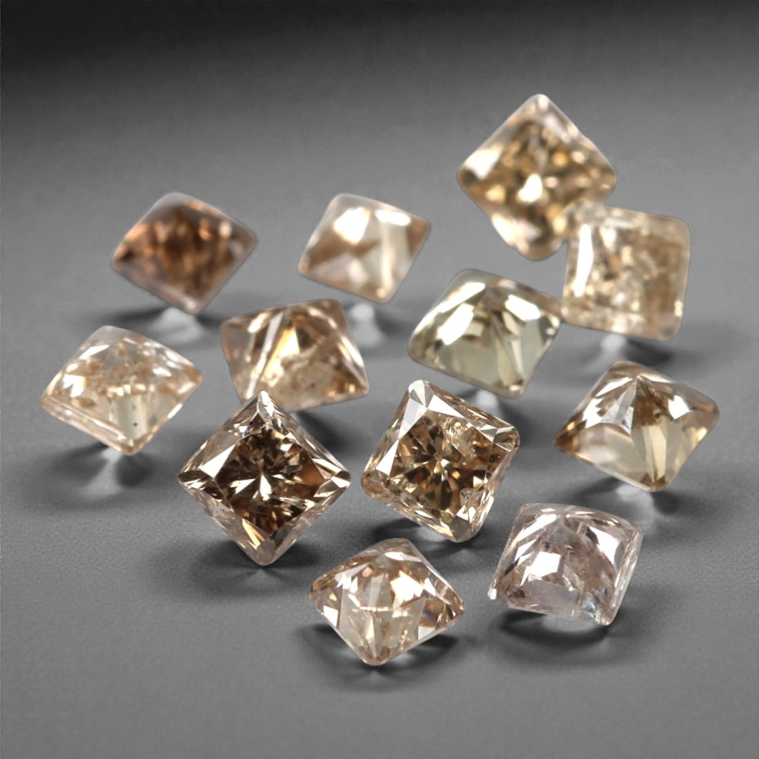 12 Pieces Champagne Diamond Parcel - Princess Cut, 0.53ct, 207A: This elegant parcel of 12 loose champagne diamond gems captivates with a warm, honeyed hue that evokes the richness of aged champagne and the glow of liquid sunlight. Each stone is cut in a well-propo