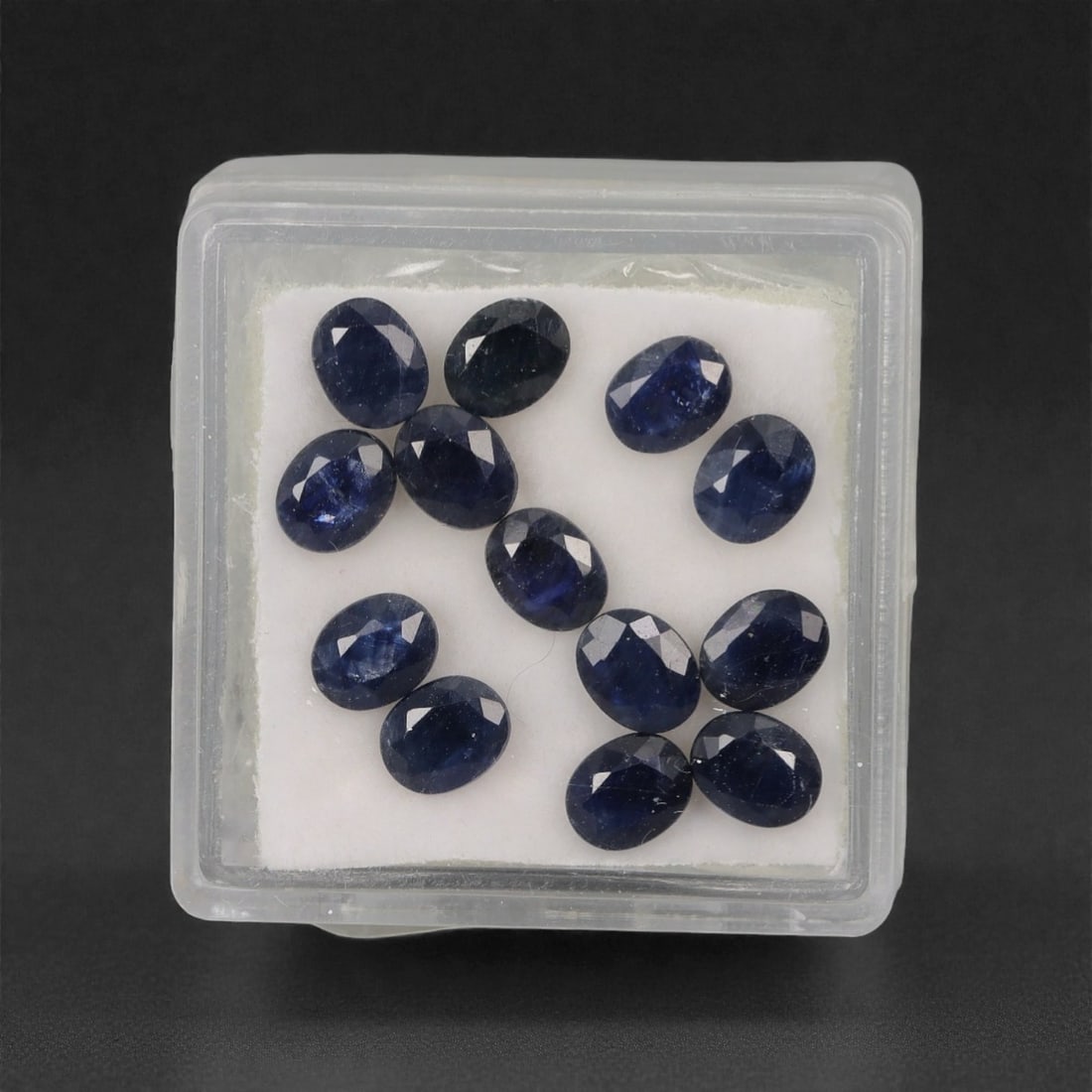 6.41 Carats Deep Royal Blue Sapphire Parcel - Natural Australian Stones, 30XL: This refined parcel of 6.41 carats of loose sapphires captivates with a spectrum of deep royal blue hues, ranging from velvety midnight tones to vivid, saturated shades that catch the light with every
