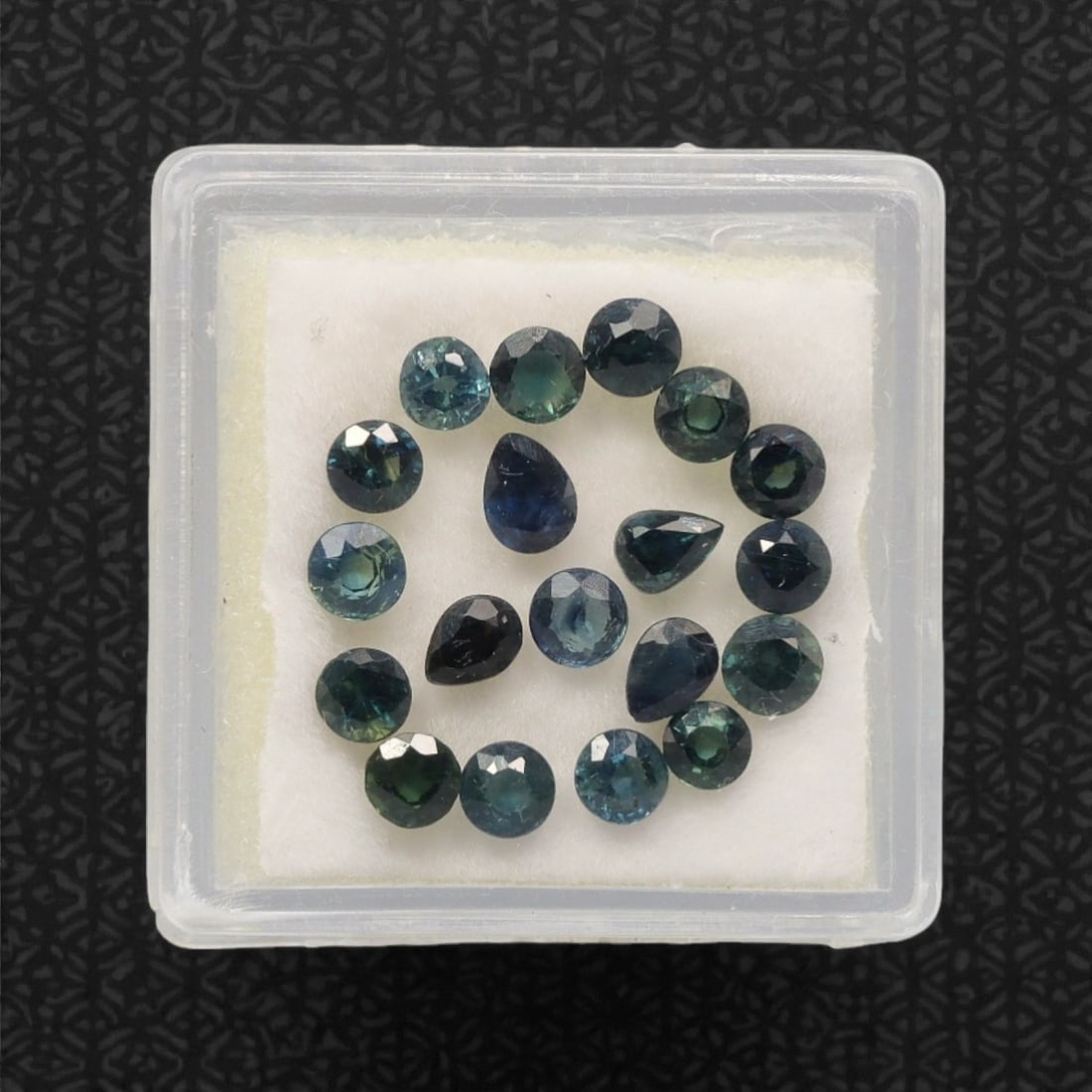4.55 Carats Parti-Colored Sapphire Parcel - Natural Australian Stones, 45DB: This curated parcel of parti sapphires captivates with a dynamic interplay of deep blue, teal, and rich green hues, each stone exhibiting the distinctive color zoning that makes Australian sapphires h