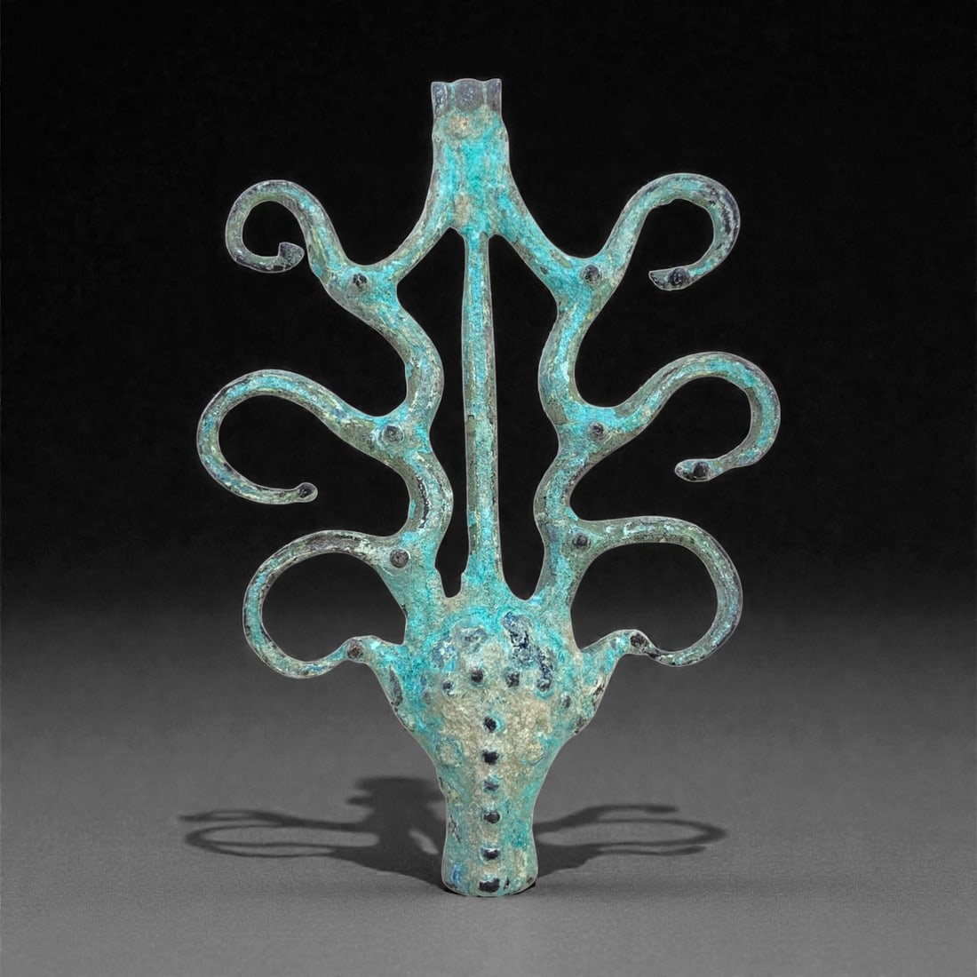 A Near Eastern Bronze Ram Head Tree-Form Ornament, 2nd-1st Millennium BCE, 82 g, 57AA (1 of 2)