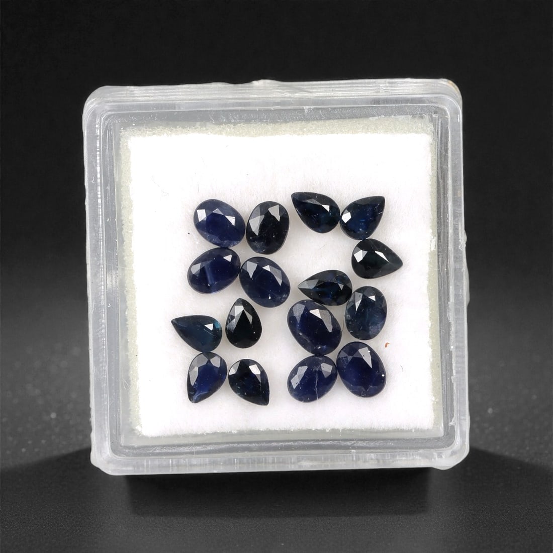 3.53 Carats Australian Blue Sapphire Parcel - Mixed Cut, 79DA: This curated parcel of mixed-cut blue sapphires from Australia exhibits a rich, deep blue hue, reminiscent of the ocean at midnight. The stones are precision-cut in a variety of shapes, including oval