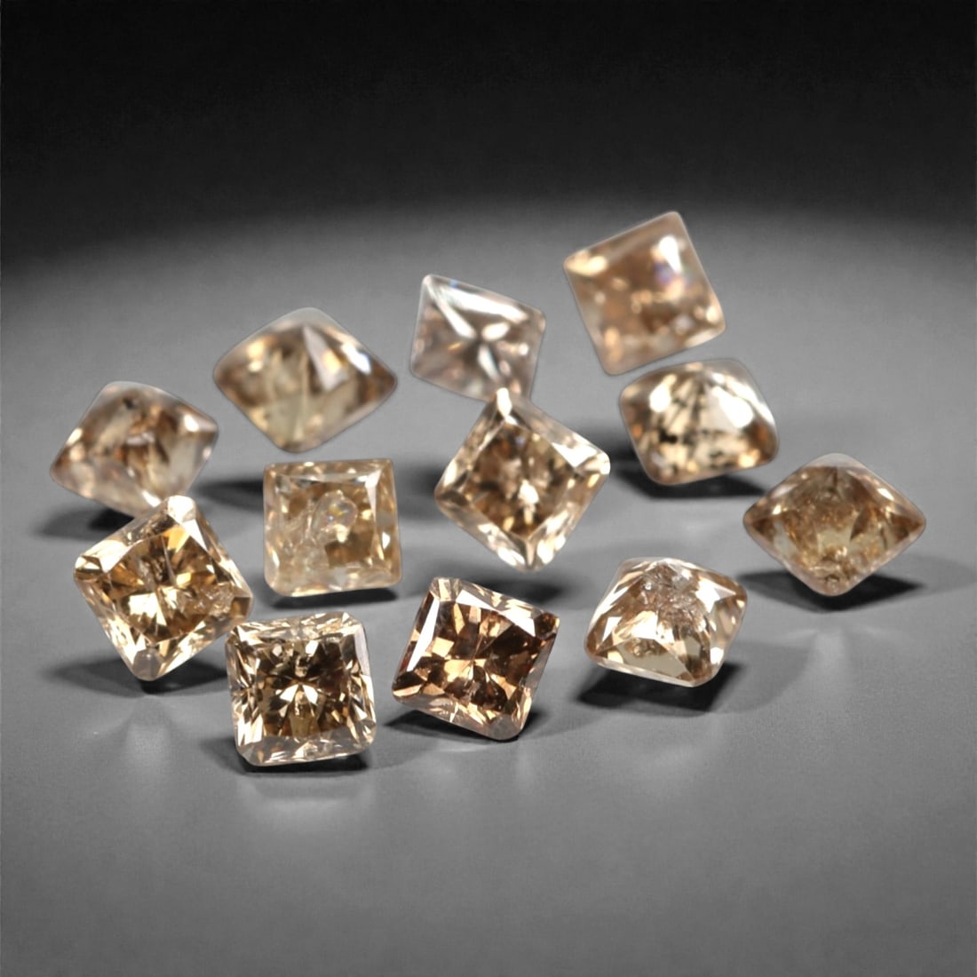 0.56ct 12 Pieces Champagne Diamond Parcel - Princess Cut, 203A: This elegant parcel of 12 loose champagne diamond gems captivates with a warm, honeyed hue that evokes the richness of aged champagne and the glow of liquid sunlight. Each stone is cut in a well-propo