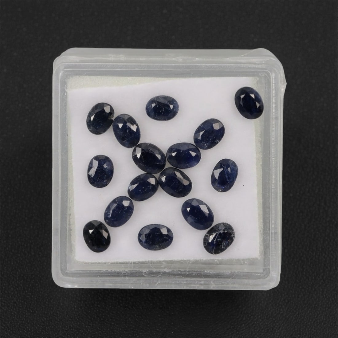 4.69 Carats Deep Royal Blue Sapphire Parcel - Natural Australian Stones, 37XL: This refined parcel of 4.69 carats of loose sapphires captivates with a spectrum of deep royal blue hues, ranging from velvety midnight tones to vivid, saturated shades that catch the light with every