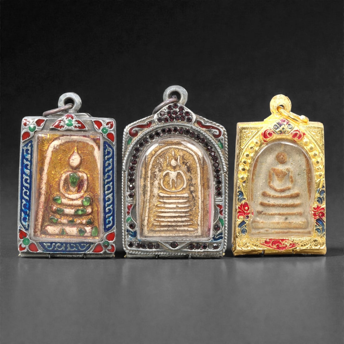 A Group of Thai Clay and Composite Buddhist Amulets, 20th Century, 21ZG (1 of 2)