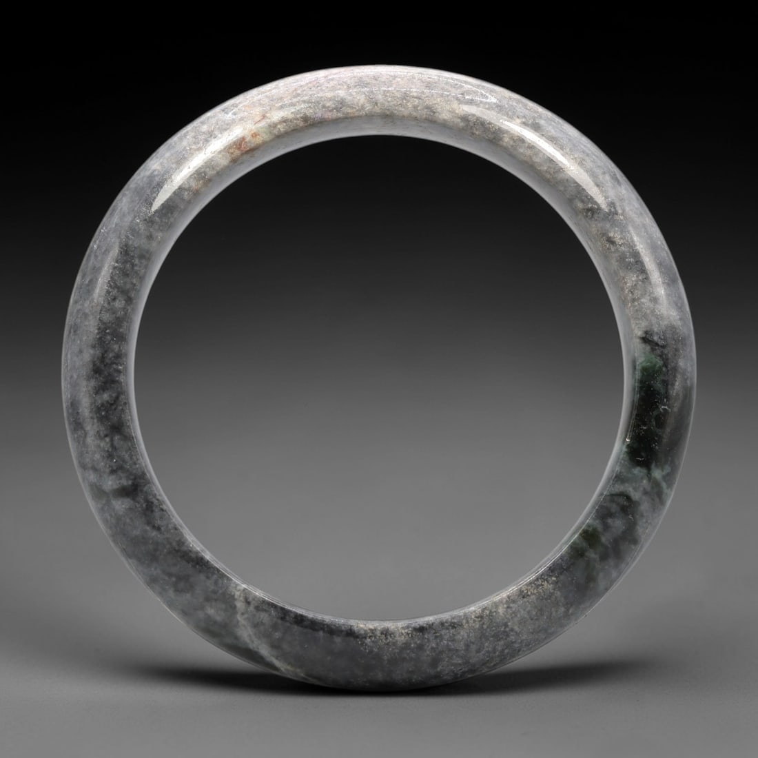 A Black Jadeite Bangle, 20th Century, 24XM (1 of 2)