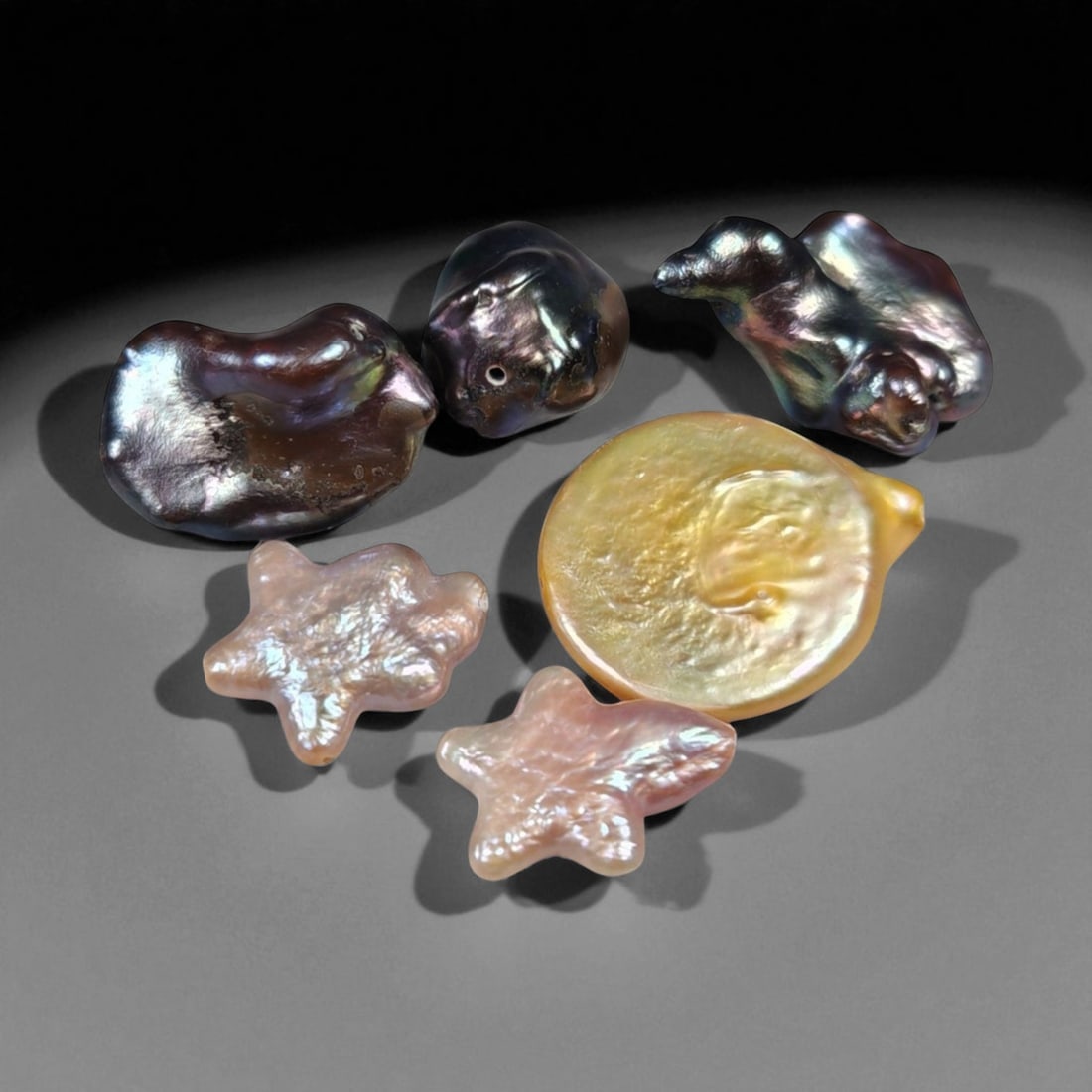 8.20 Grams Multicolor Keshi Pearl Selection - Natural Freshwater Pearls, 50XA: This distinctive grouping of multicolor keshi pearls presents a captivating display of iridescent tones ranging from bronze, aubergine, and peacock green to warm gold and blush pink. Each pearl measur