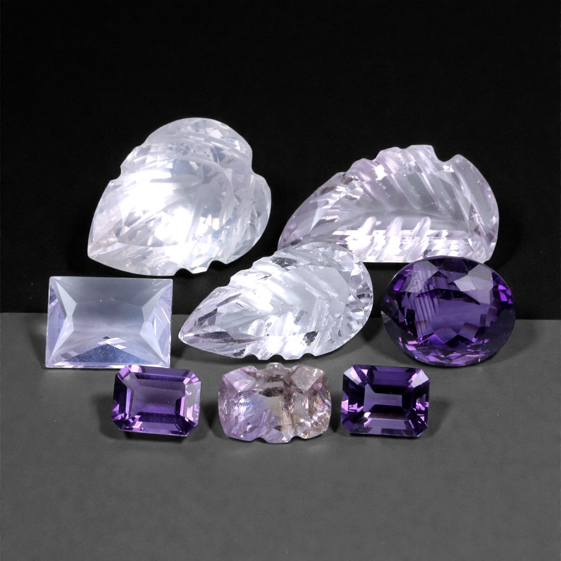73.64 Carats Mixed Purple Amethyst Selection - Natural Brazilian Stones 8-23mm, 67XH, 67XH: A captivating array of amethyst gemstones ranging from deep royal purple to delicate lavender and near-colorless tones, this selection showcases the wide beauty spectrum of quartz in its finest forms.