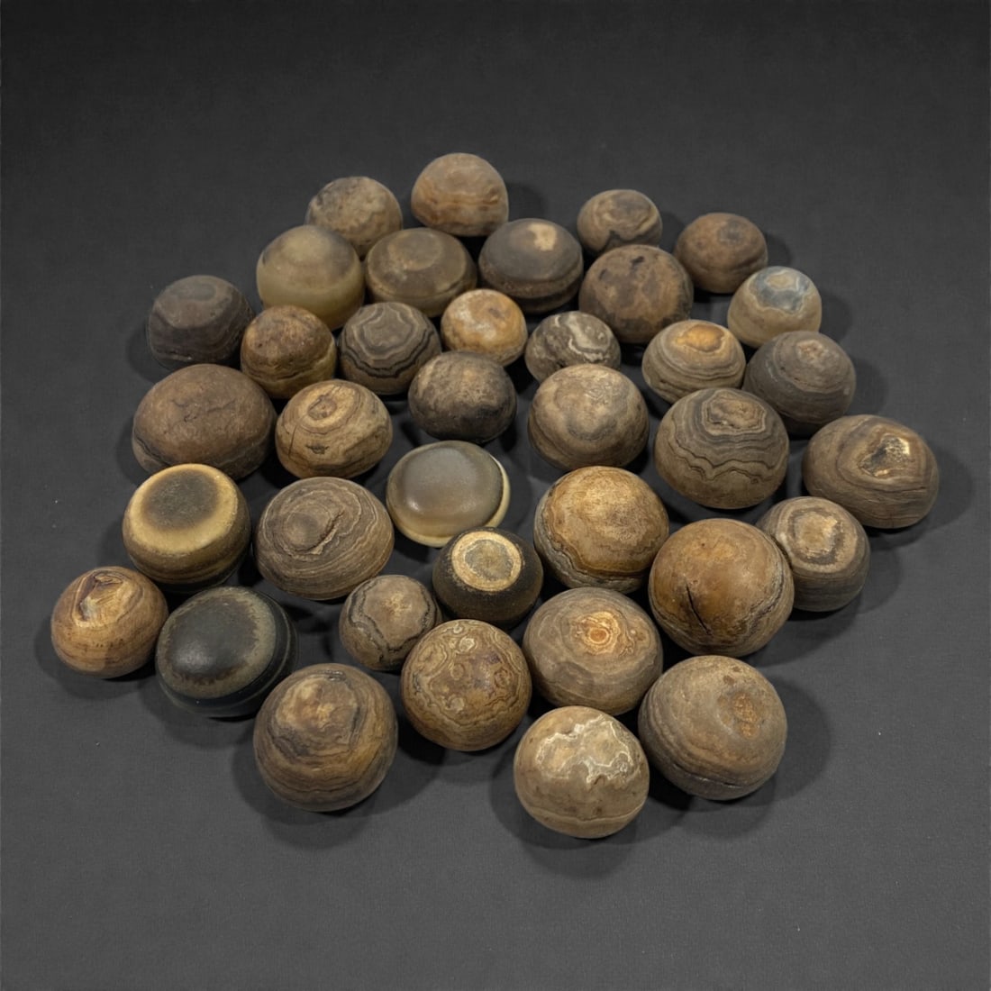 A Group of Tibetan Luk Mik ("Goat's Eye") Agate Beads, 19th-20th Century, 47W (1 of 1)