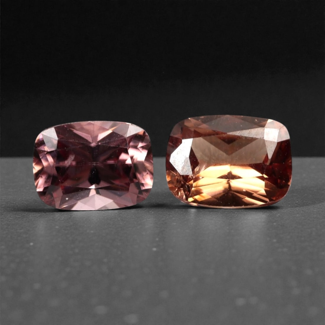 3.08 Carats Peach and Brown Zircon Selection - Natural Cambodian Stones, 303A: This curated selection of two cushion-cut zircon gems presents a warm, earthy palette of soft peach and rich brown tones, each stone exhibiting exceptional brilliance and light dispersion. The precisi