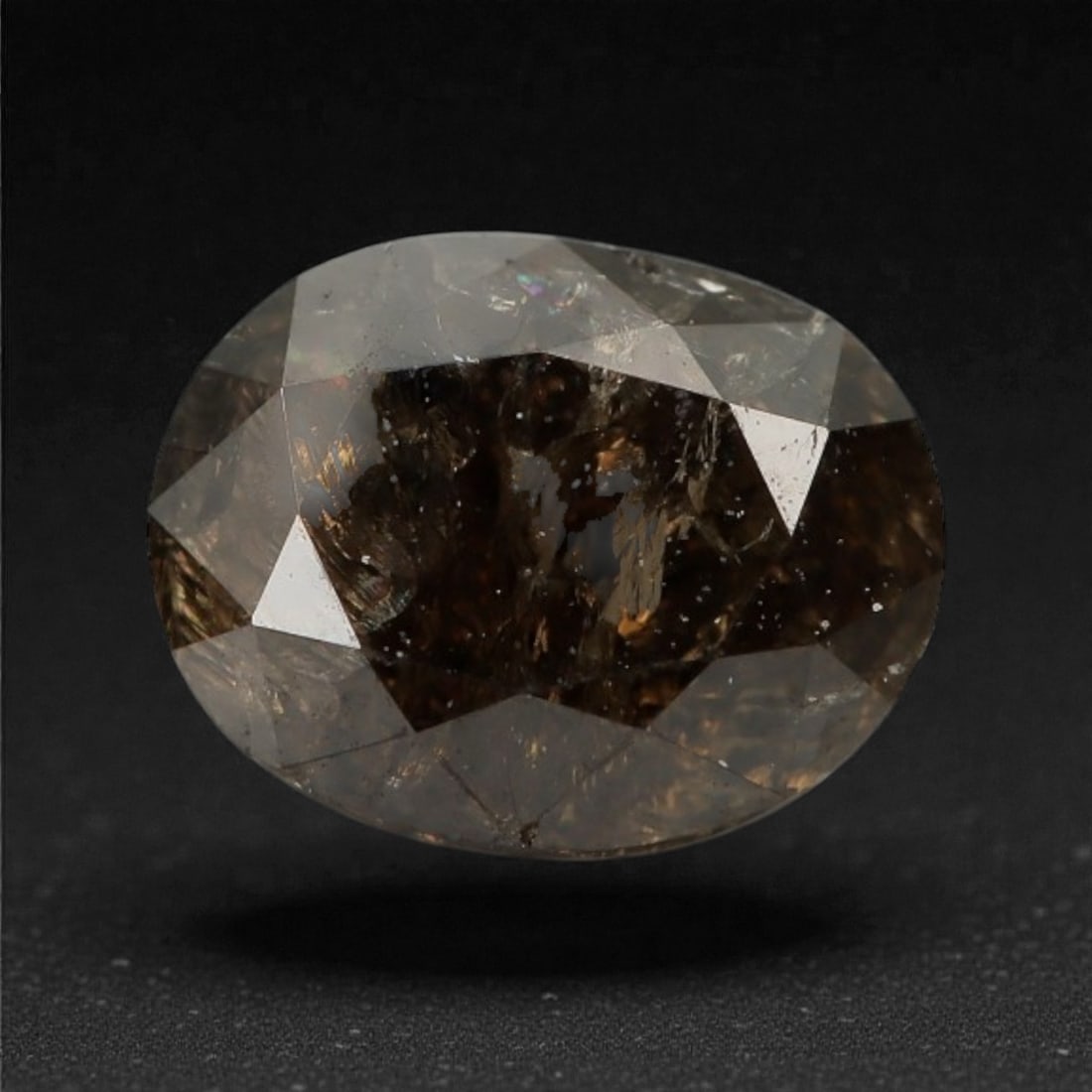 0.34 Carats Cognac Fancy Diamond - Natural African Stone, 4.7x3.7mm, 29A: This singular cognac fancy diamond radiates with a warm, ambered glow, evoking the rich tones of aged brandy and sunlit honey. Precision-cut in a classic brilliant shape, its facets catch light to rev