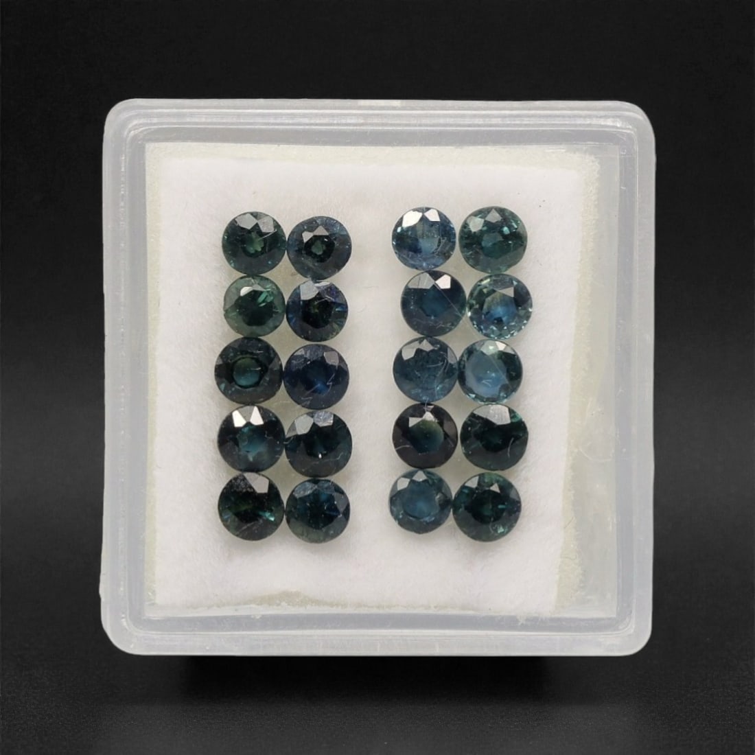 4.51 Carats Multicolor Australian Sapphire Parcel - Natural Loose Gemstones, 47DB: This exquisite parcel of Australian sapphires showcases a captivating spectrum of deep blues, teals, and rich greenish-blue hues, each stone cut to maximize brilliance and color saturation. The facete